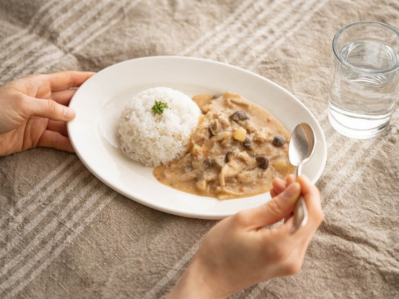 Poêlée de porc sauce crème champignons et riz